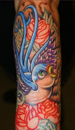 Gido - bird tattoo